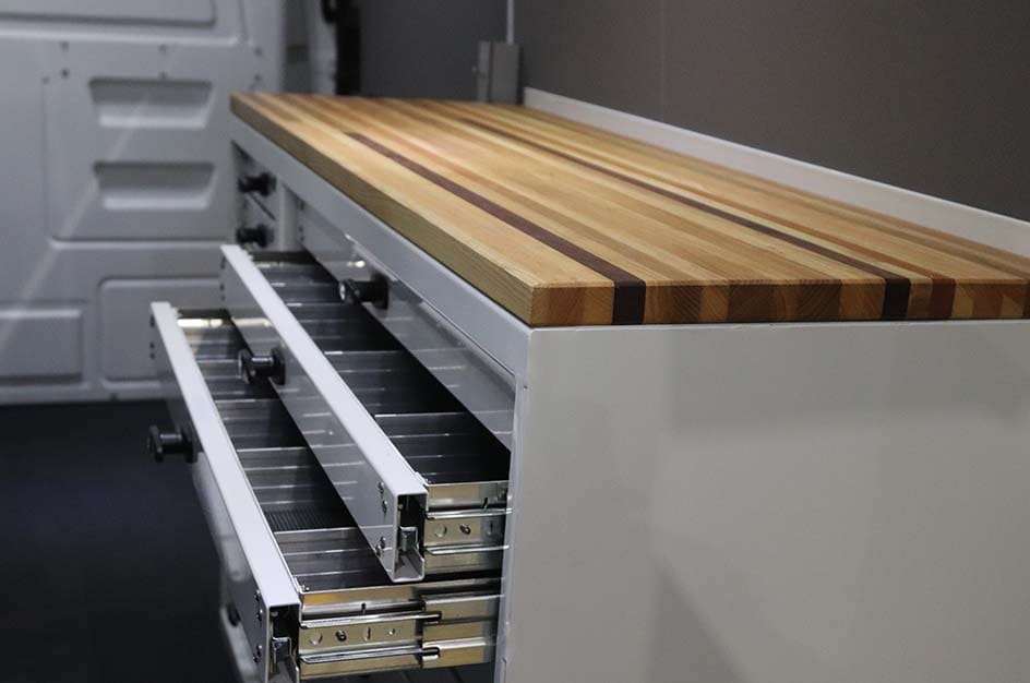 Stellar toolbox and workbench in a service van with drawers open
